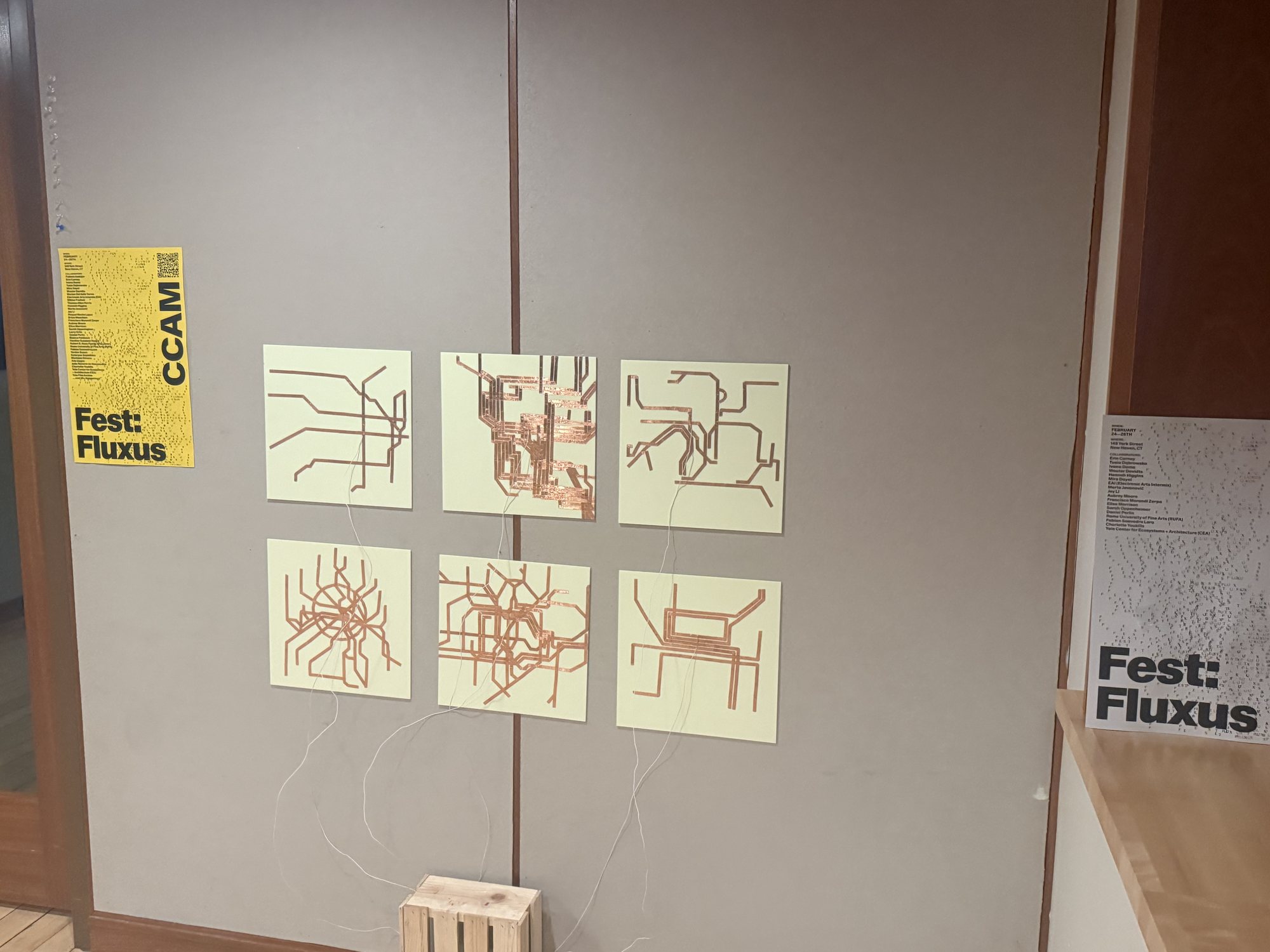 The six maps on the wall, with the festival poster to the left and a Fest: Fluxus sign on the windowsill.